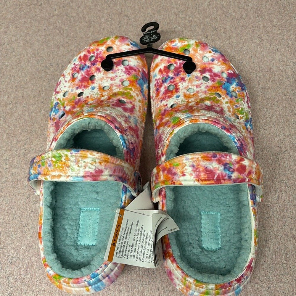 Multi color fur lined Crocs
Brand new